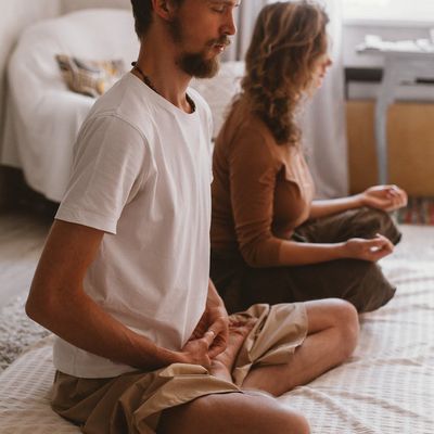 A person taking a deep breath before exercise.